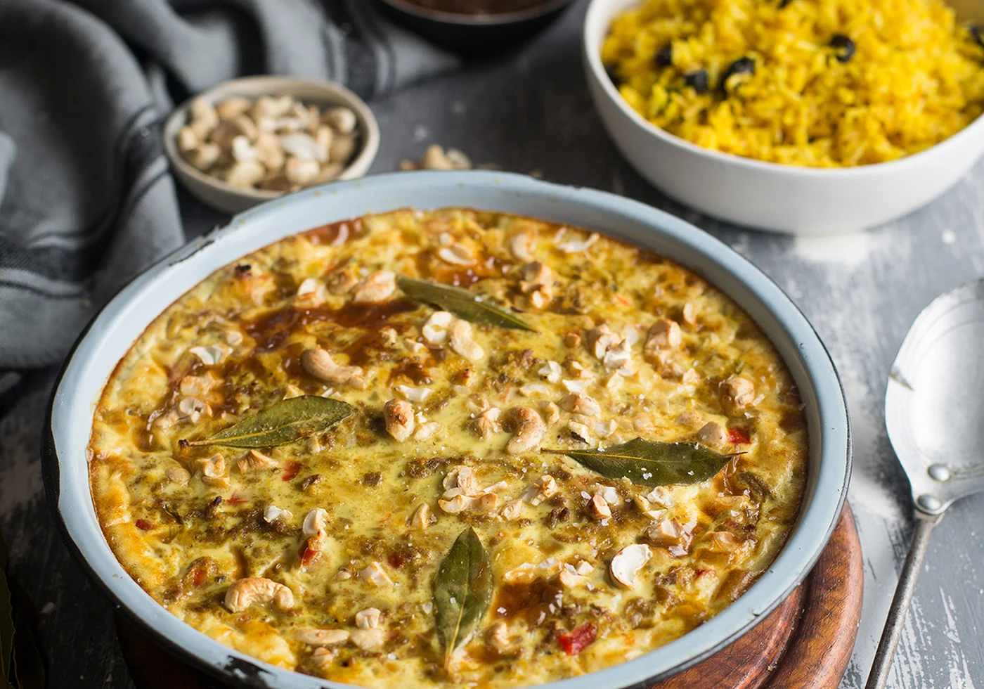South African bobotie served with yellow rice and chutney